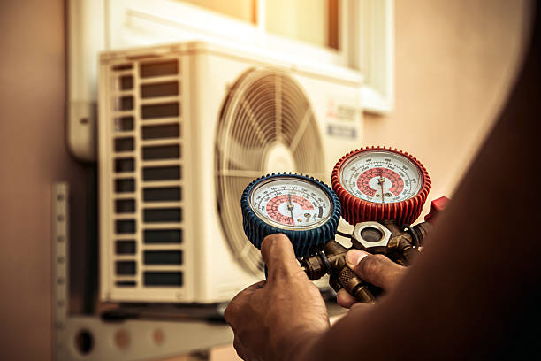 Professional Heat Pump Repair technician working in Elco, PA